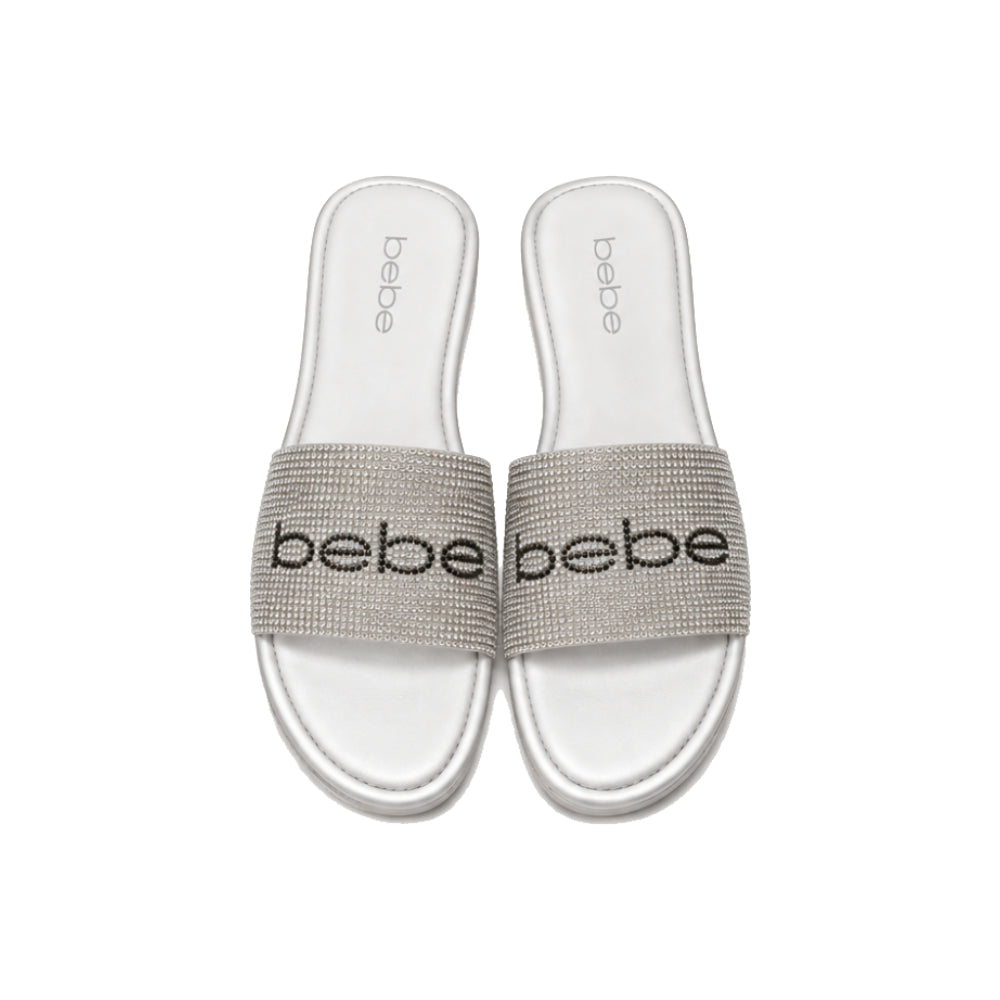 Bebe Rhinestone Logo Slide Sandals In White/Silver