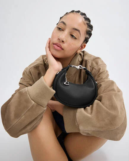 Coach Jonnie bag in black and silver accessories