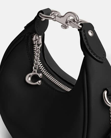 Coach Jonnie bag in black and silver accessories