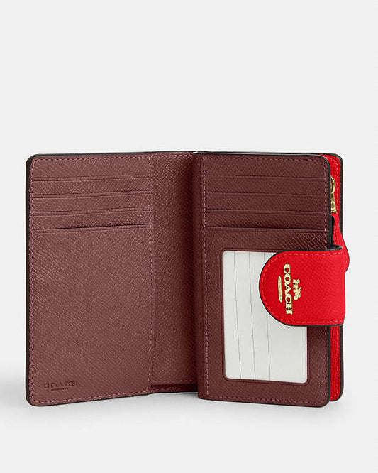 Coach Medium Corner Zip Wallet in Bright Poppy in gold accessories