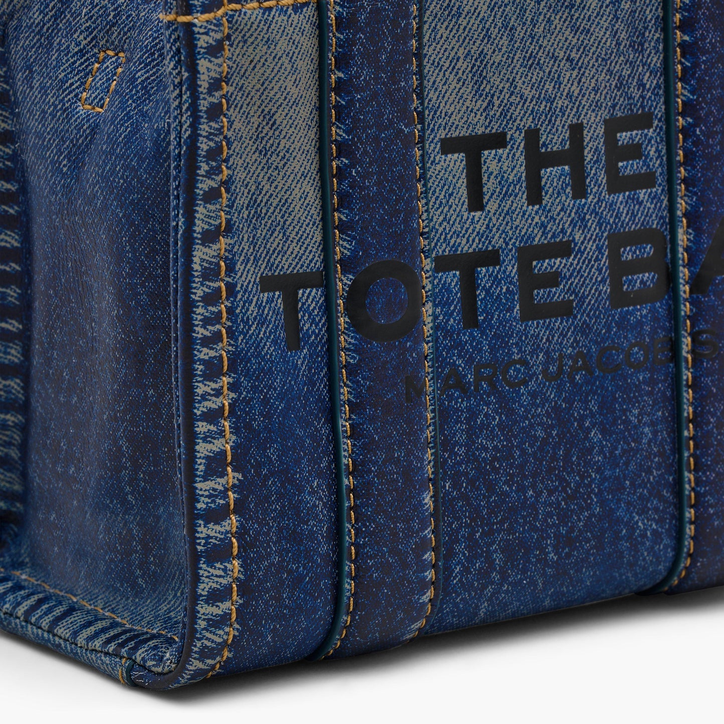 Marc Jacobs
THE DENIM-PRINTED LEATHER MICRO TOTE BAG