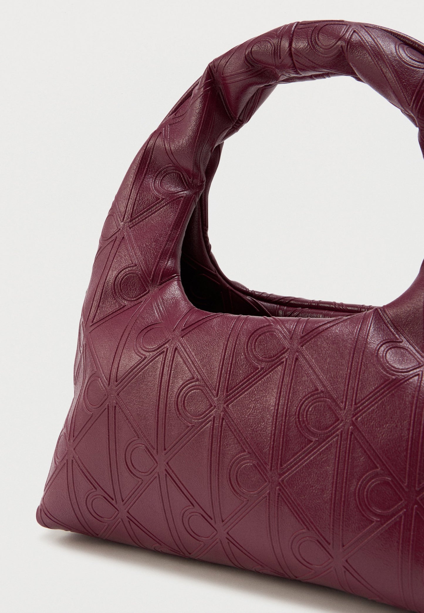 Calvin Klein Puffer Emblem Logo Small Bag in burgundy