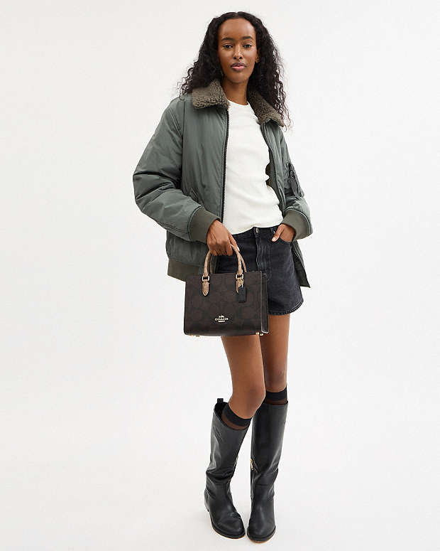 Coach maggie small tote bag blocked in signature canvas