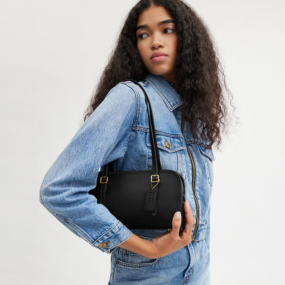 Coach Swing Zip