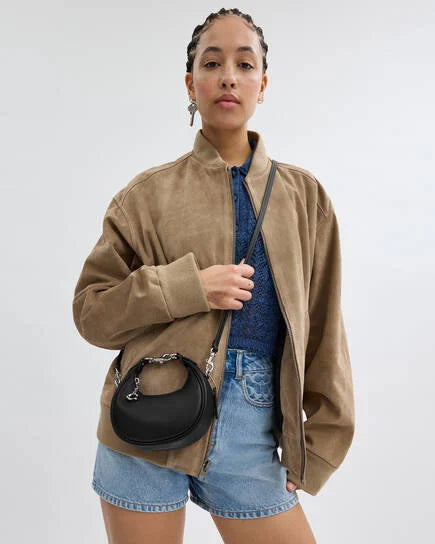 Coach Jonnie bag in black and silver accessories