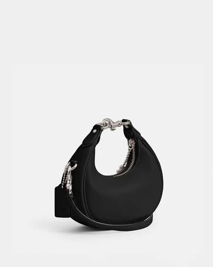 Coach Jonnie bag in black and silver accessories
