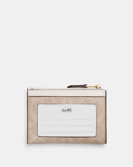 Coach Mini Skinny Id Case In Signature Canvas