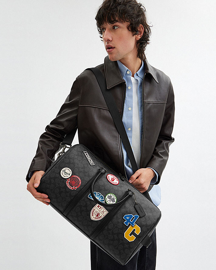 Coach VENTURER Classic Signature Canvas And Badge Handbag