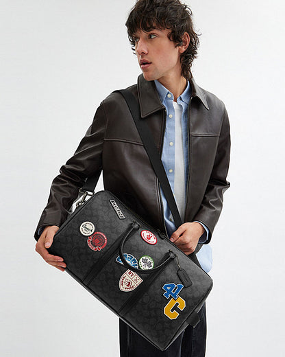 Coach VENTURER Classic Signature Canvas And Badge Handbag