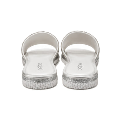 Bebe Rhinestone Logo Slide Sandals In White/Silver