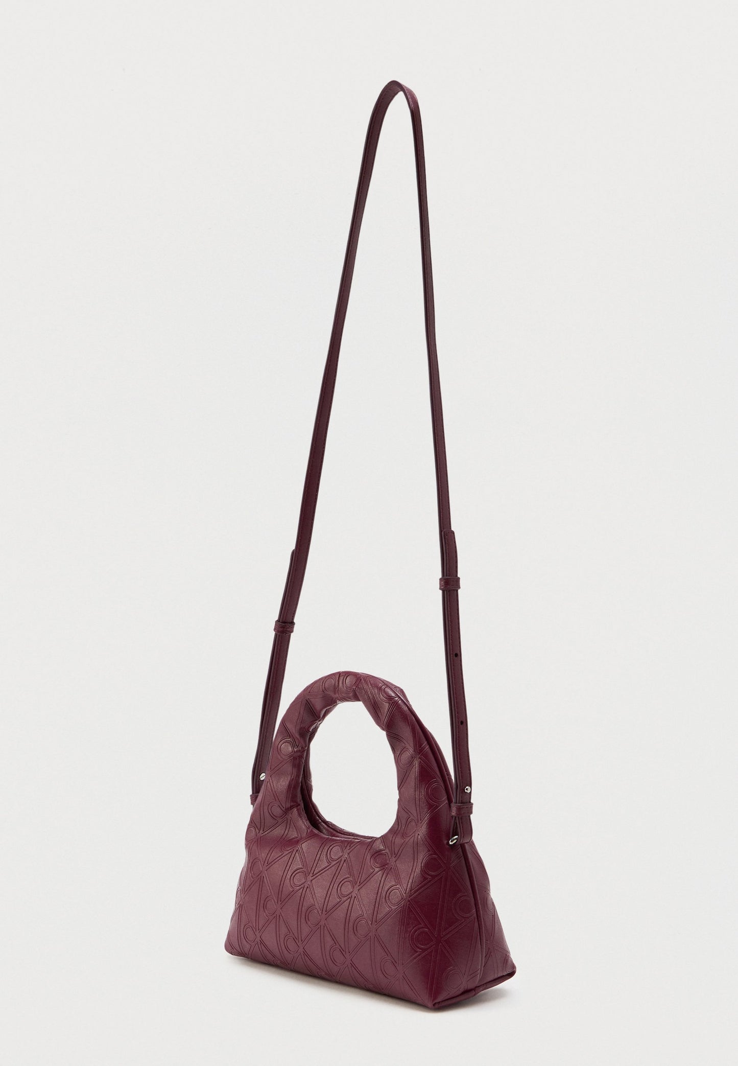 Calvin Klein Puffer Emblem Logo Small Bag in burgundy