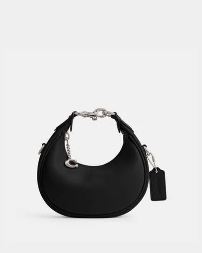 Coach Jonnie bag in black and silver accessories