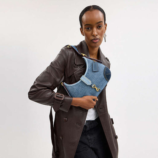 Coach Hamptons Hobo Bag
With Repurposed Denim