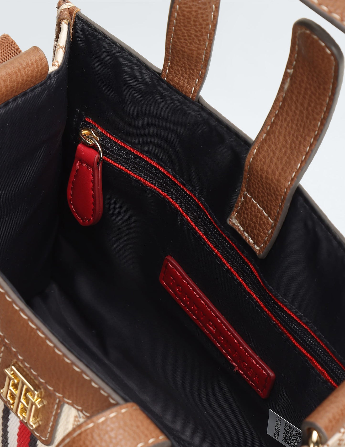 Tommy Hilfiger Brand Logo Textured Handheld Bag in beige