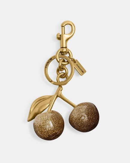 Coach Cherry Bag Charm in gold