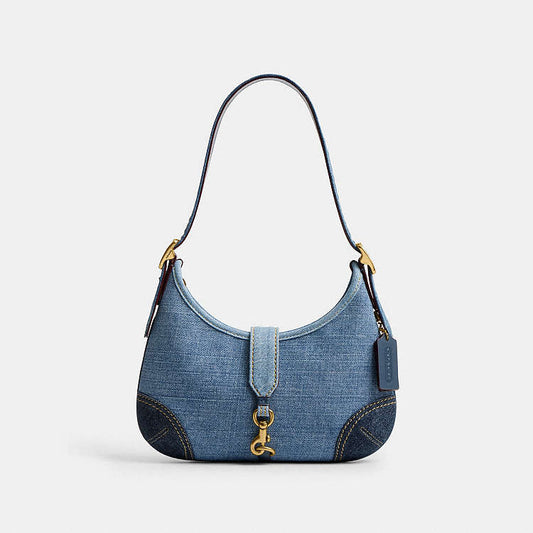 Coach Hamptons Hobo Bag
With Repurposed Denim