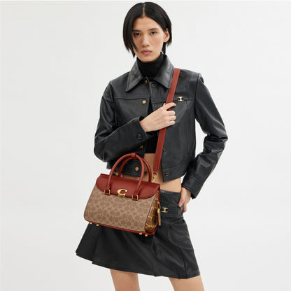 BROOME CARRYALL IN SIGNATURE CANVAS WITH SNAKESKIN DETAIL