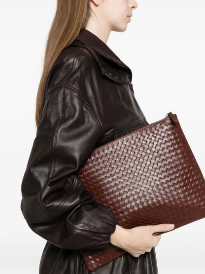 DRAGON DIFFUSION
A4 woven clutch bag in brown