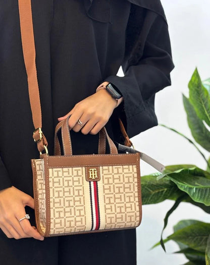Tommy Hilfiger Brand Logo Textured Handheld Bag in beige