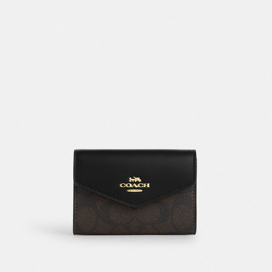 Coach Flap Card Case In Signature Canvas in walnut black