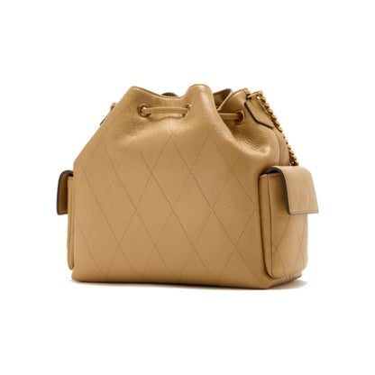Tory Burch Charlie Quilted Drawstring Shoulder Bag In Beige