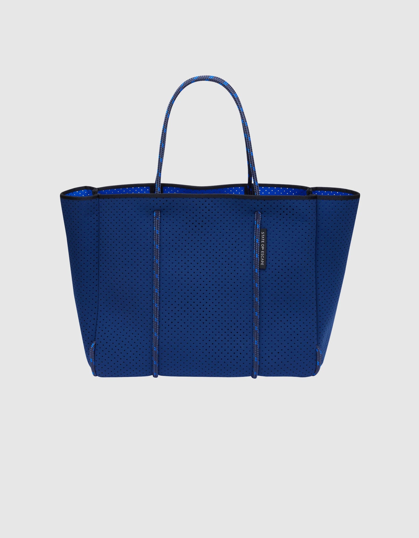 State of escape medium tote bag Flying Solo tote in navy: electric blue (dual tone)
