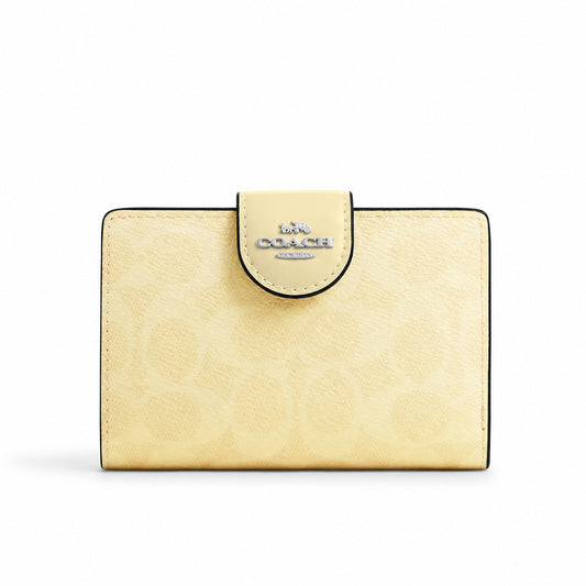 Coach Medium Corner Zip Wallet in Pale Yellow Signature Canvas